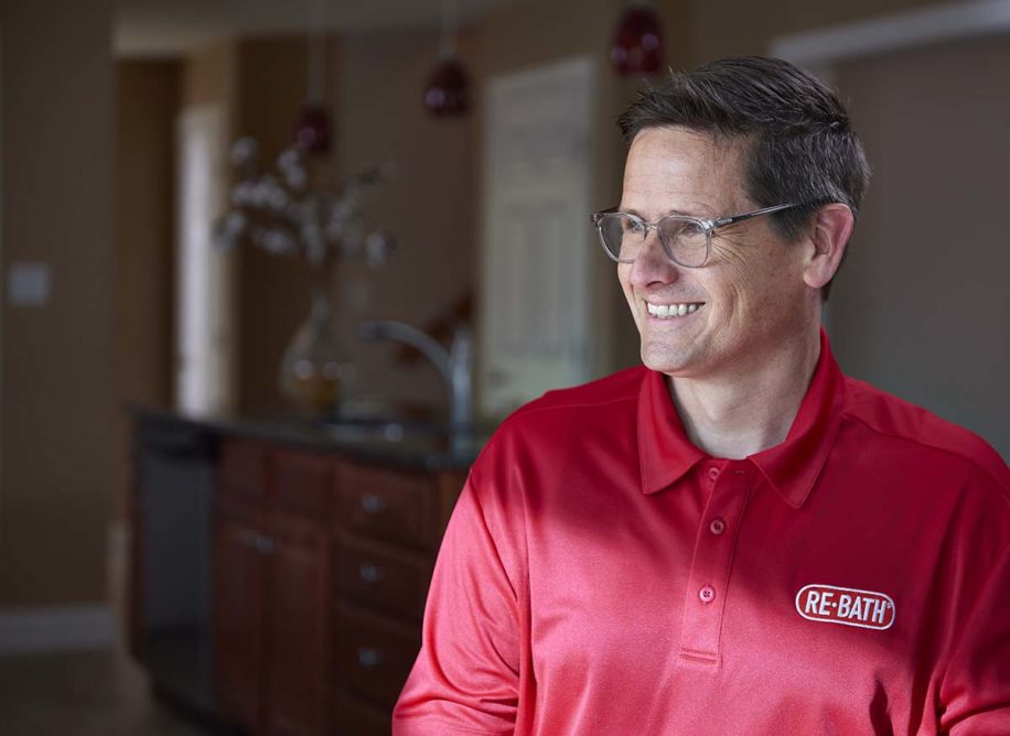 man in red re-bath shirt