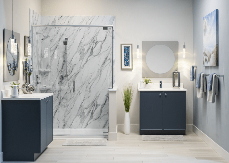 A contemporary bathroom with a glass shower and other appealing, modern design features | Re-Bath