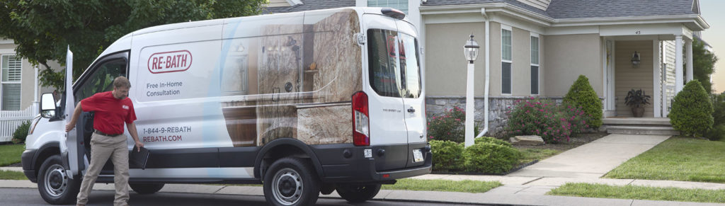 man walking out of re-bath van