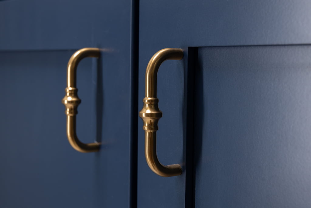 Contemporary Blue Cabinets with Bronze Fixtures Photo